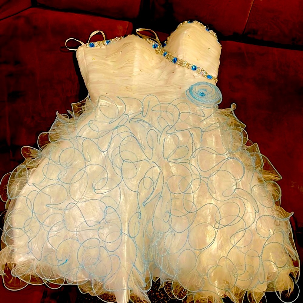 Beautiful white with blue accents. Size 6